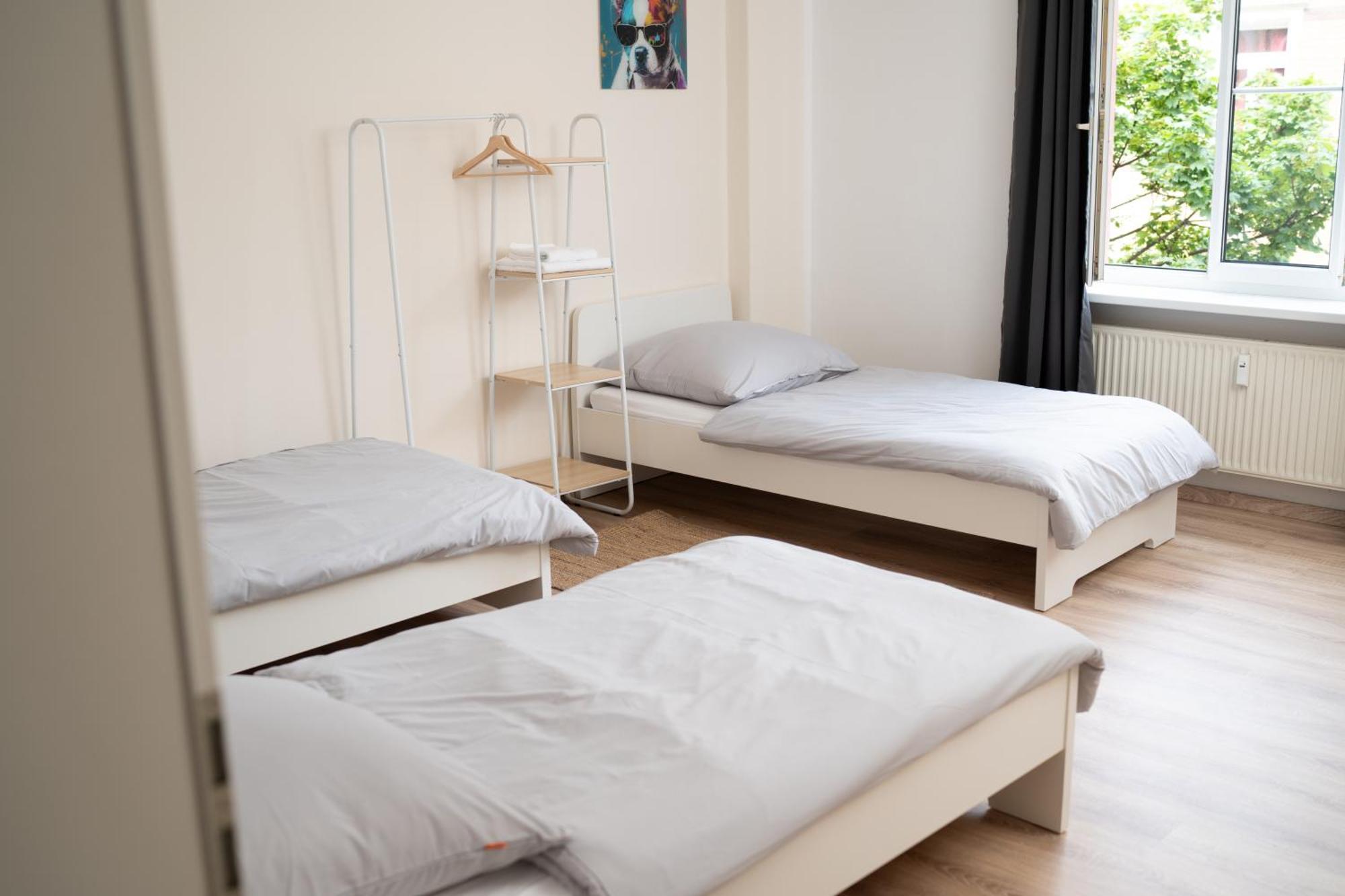 Design Ferienoase Mit Einzelbetten - 2 Schlafzimmer - Waschmaschine - Parkplatz